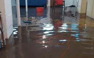 Basement with boiler, cabinets and washing machine completely flooded in Norfolk, VA